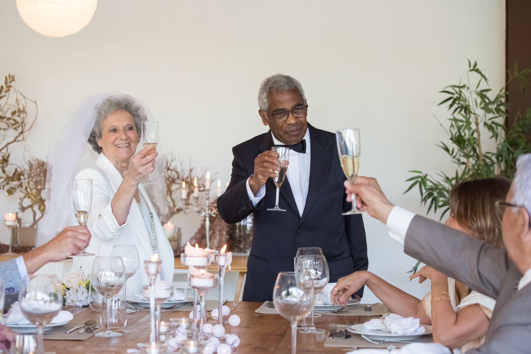 A family raising a toast at the table